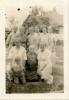 Back row: Rachel Wilson, Grandma Gritton, Eva Hedges, Ethel Gritton, Katie Cosat, Kate Randall. 
Seated: Cora Hedges and grandson Donald, blurred unidentified woman, Ella Cosat, Mary Gritton