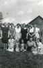 Group of women outside a barn