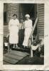 Moore, Caroline Moore Robinson on the left with two patients.